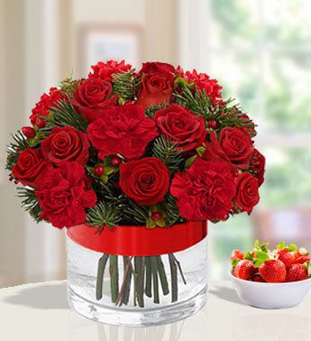 Arrangement of 8 red roses and 5 red carnations in a glass vase with fillers and cherry (same as picture) Color of Love
