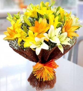 Bunch of 3 stems of white lilies , 3 stems of orange lilies and 3 stems of yellow lilies in nice wrapping (Approx 27 Flowers) Perfect Lilies