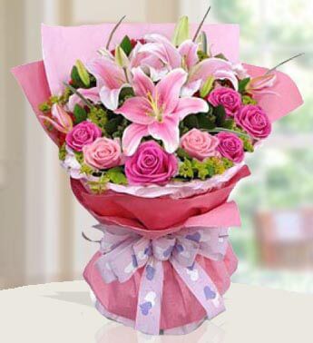Bunch of 2 Stems of Pink Lilies (Approx 6 Flowers) & 10 Stem of Pink Roses with fillers in nice wrapping Summer Medley Bouquet