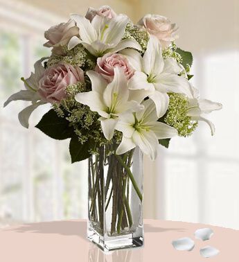BUNCH of 2 Stem of White Lilies (Approx 6 Flowers) and 6 Stem of Peach Roses with fillers Softly Speaking