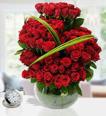 Glass vase with 100 Stems Of Red Roses in step with steel grass (as image) Roses Beauty..100