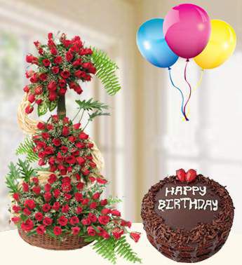 4feet stand arrangement of 100 Roses in a basket in 3 steps (as image) with 1/2 Kg Chocolate Cake and 3 Latex Balloon Height Of Love Combo