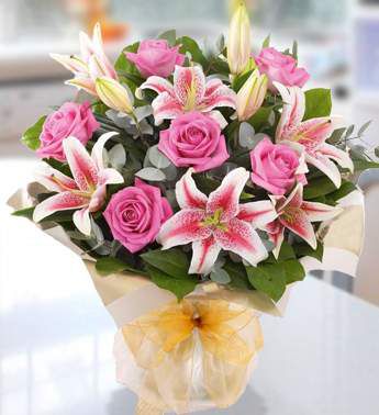 Bunch of 3 stems of Pink Lily & 8 Stems of Pink Rose In nice wrapping Blush Of Love