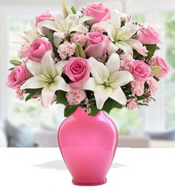 12 Pink Carnation, 4 stems of White Lily, 10 Pink Rose in a pink Vase (One side round arrangement) Simply Elegant